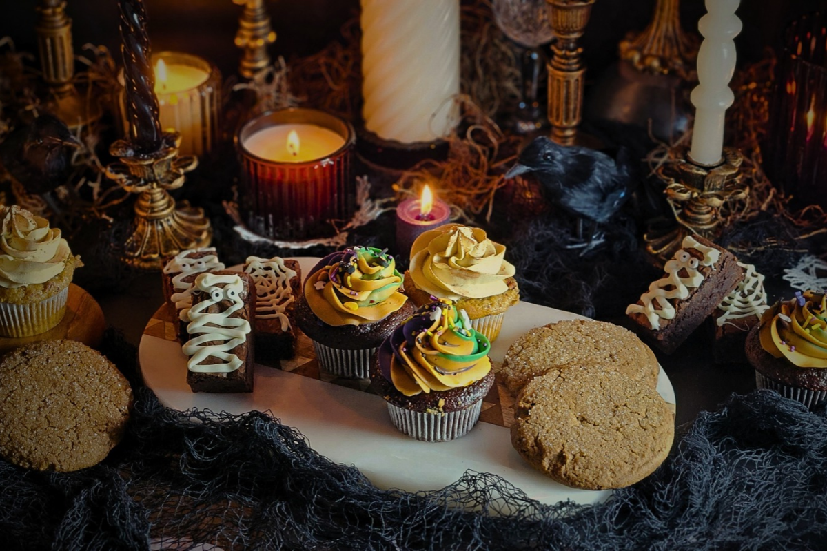 Halloween baked treats showing cupcakes, brownies and cookies